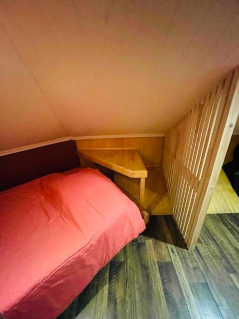Postel nebo postele na pokoji v ubytování Corner Hostel Puerto Natales