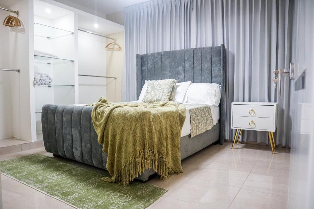 Postel nebo postele na pokoji v ubytování Residencial Nany