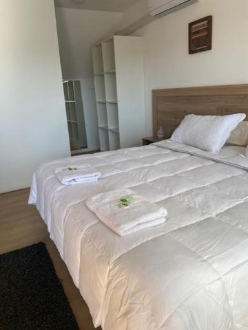Postel nebo postele na pokoji v ubytování Casa Parral Hostal