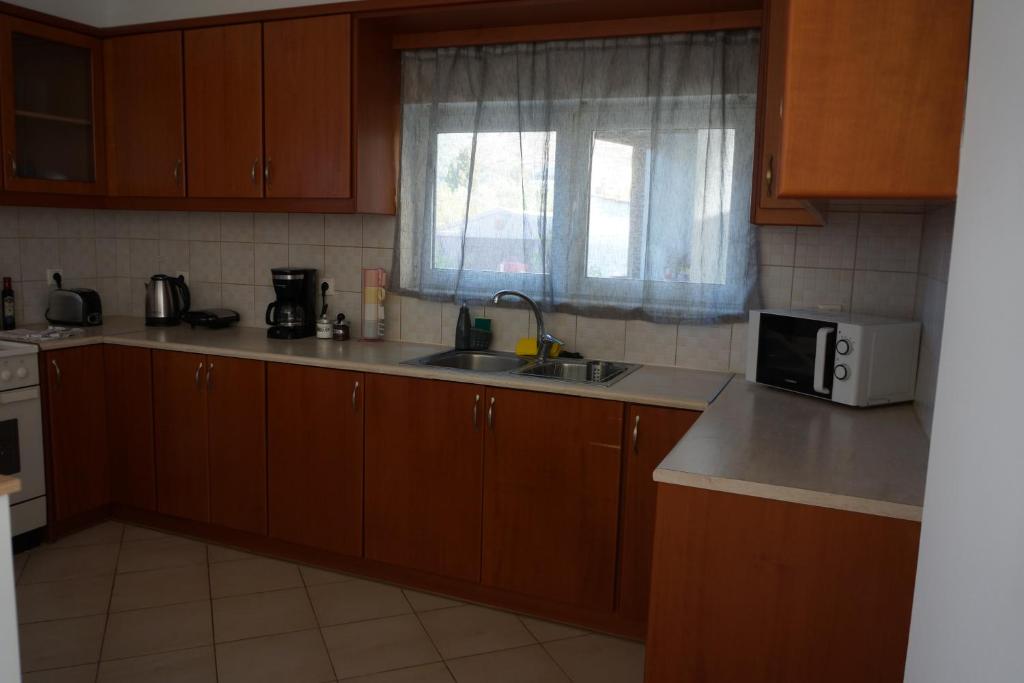 Kuchyň nebo kuchyňský kout v ubytování Yapyli Home