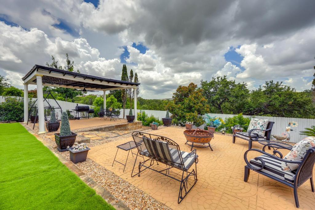 a patio with chairs and a gazebo at San Antonio Home - Outdoor Oasis and Greenbelt Views in San Antonio