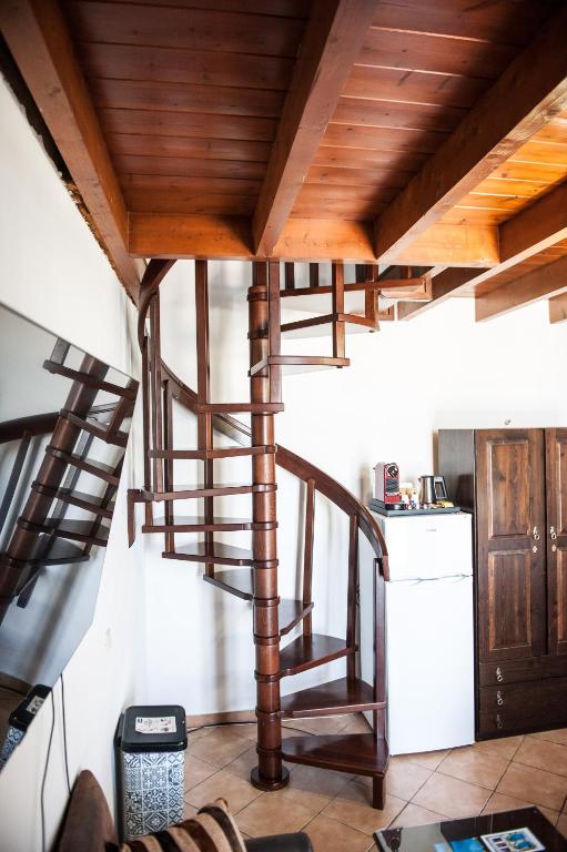 Kuchyň nebo kuchyňský kout v ubytování SeaFront Stone Suites