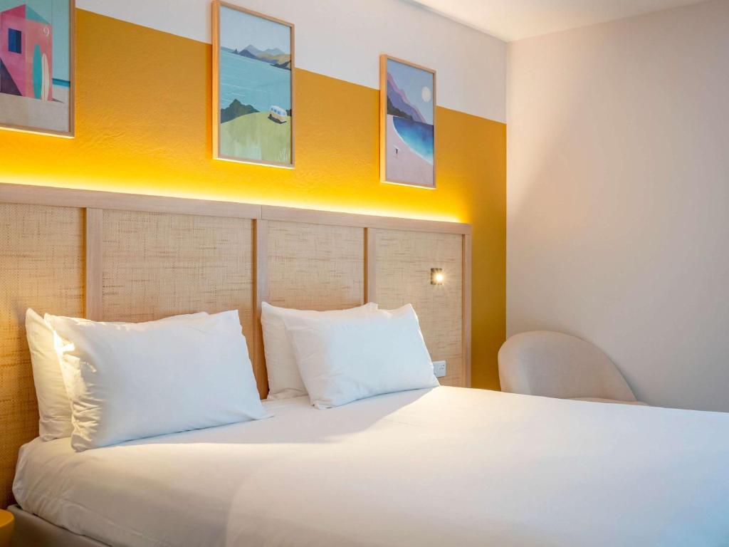 Postel nebo postele na pokoji v ubytování ibis Styles Biarritz Plage