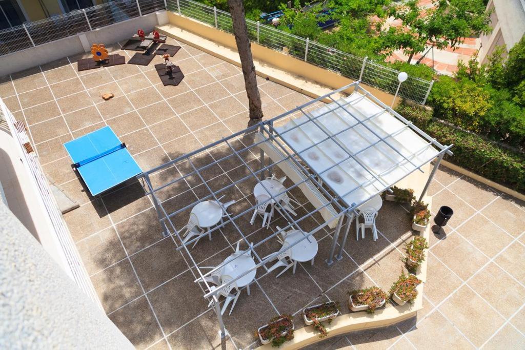 A patio or other outdoor area at APARTBEACH FONT DE MAR 5º Clima Piscina y Vista Playa
