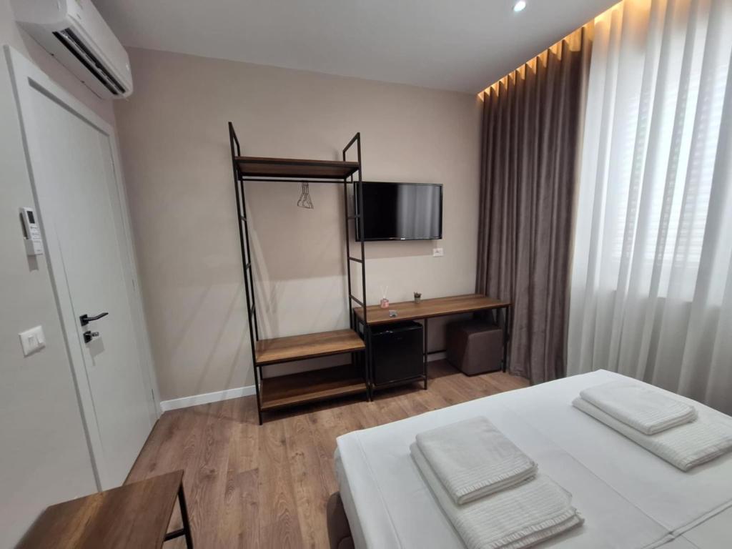 Postel nebo postele na pokoji v ubytování Vila BABE