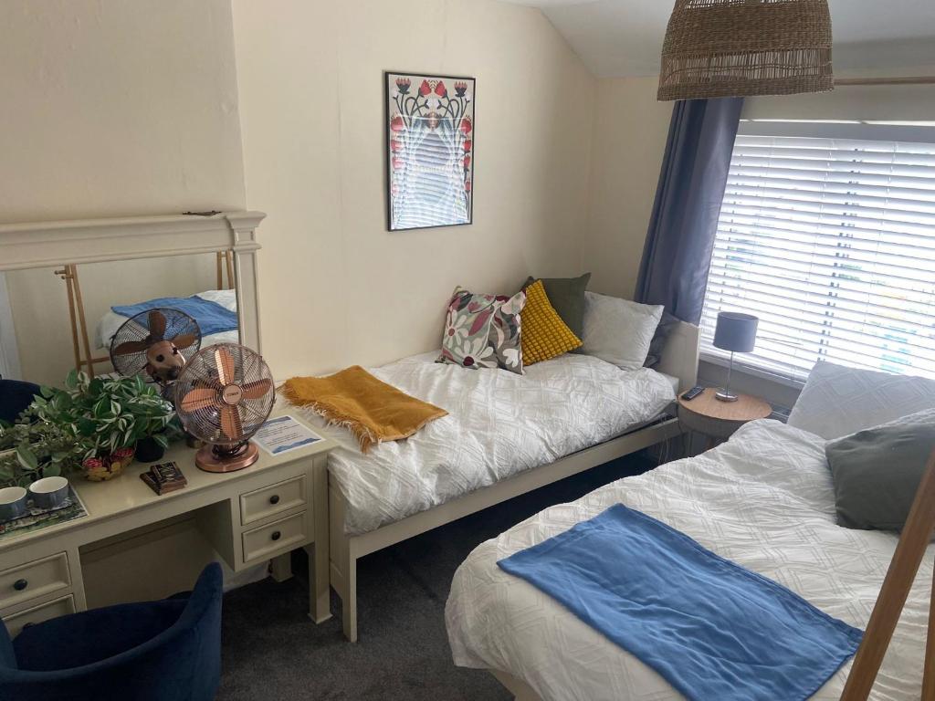 Postel nebo postele na pokoji v ubytování Grand Canal Private Rooms