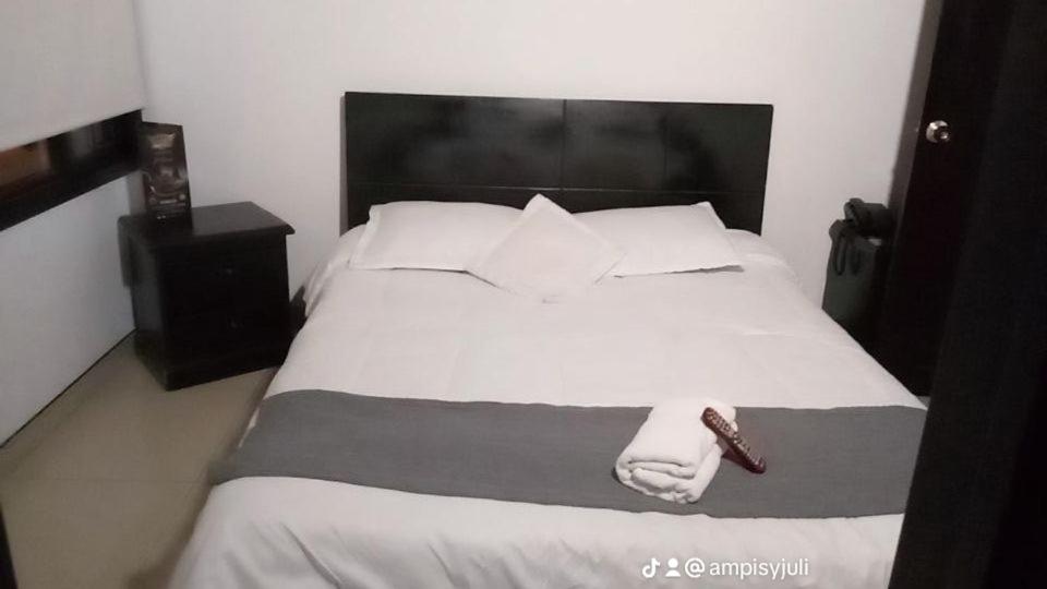Postel nebo postele na pokoji v ubytování hotel laguna 24