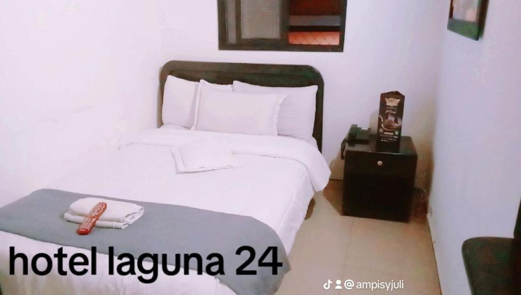 Postel nebo postele na pokoji v ubytování hotel laguna 24