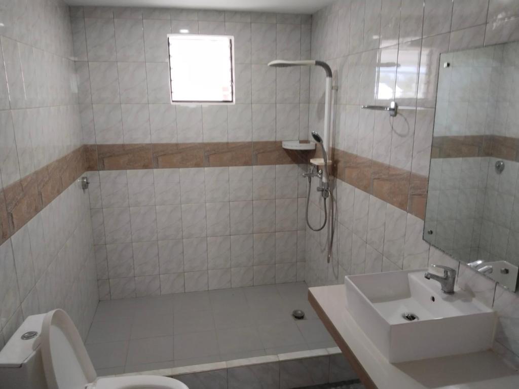 Koupelna v ubytování Alona Garden Suites