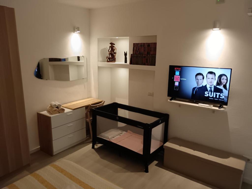 TV a/nebo společenská místnost v ubytování La Divina Suites
