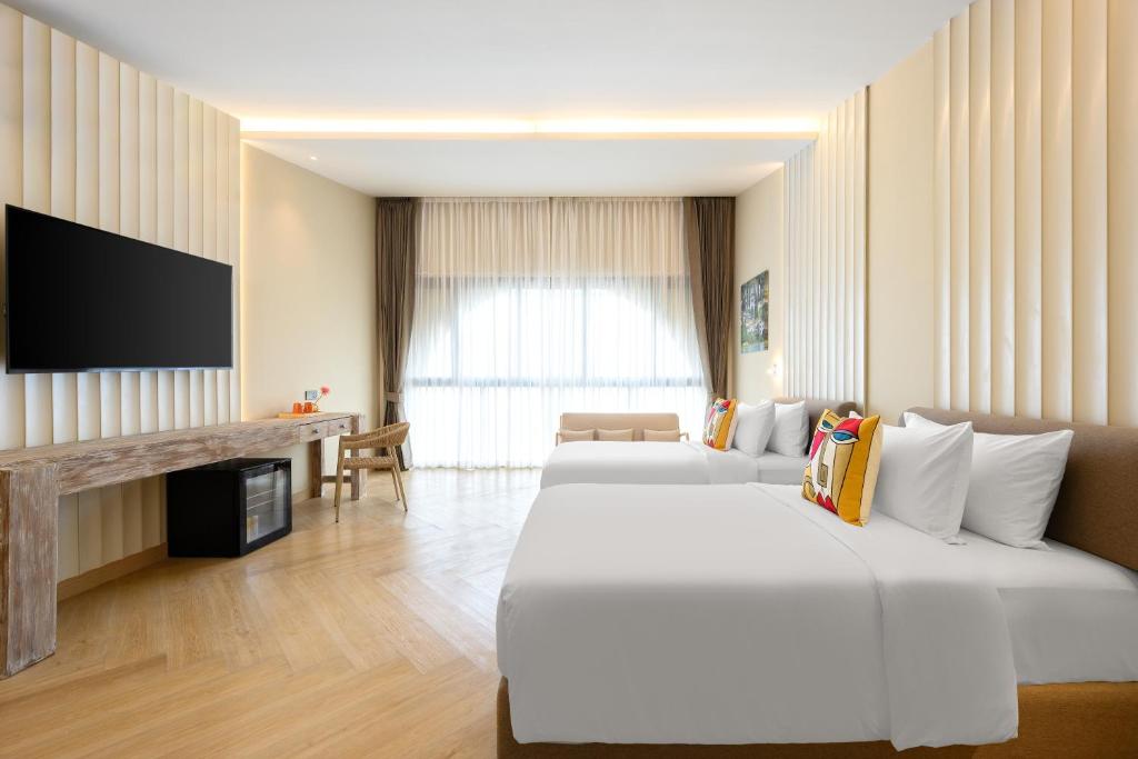 TV a/nebo společenská místnost v ubytování Centara Life Lamai Resort Samui