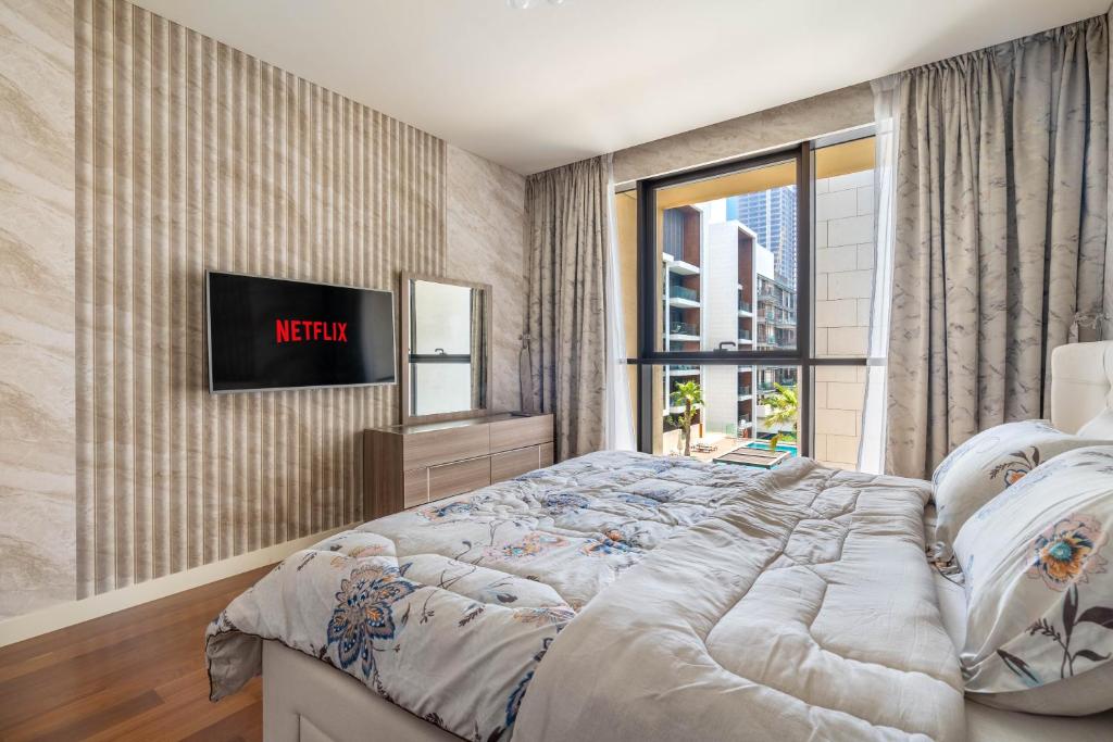 Postel nebo postele na pokoji v ubytování City walk apartment Specter