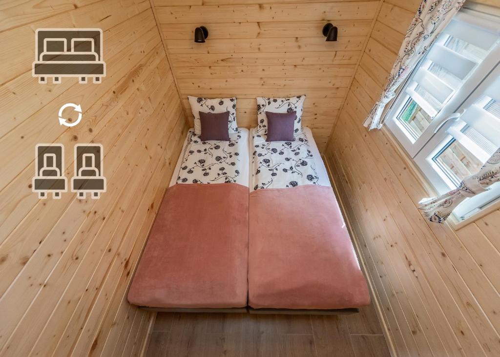 Posteľ alebo postele v izbe v ubytovaní Domek Romanówka