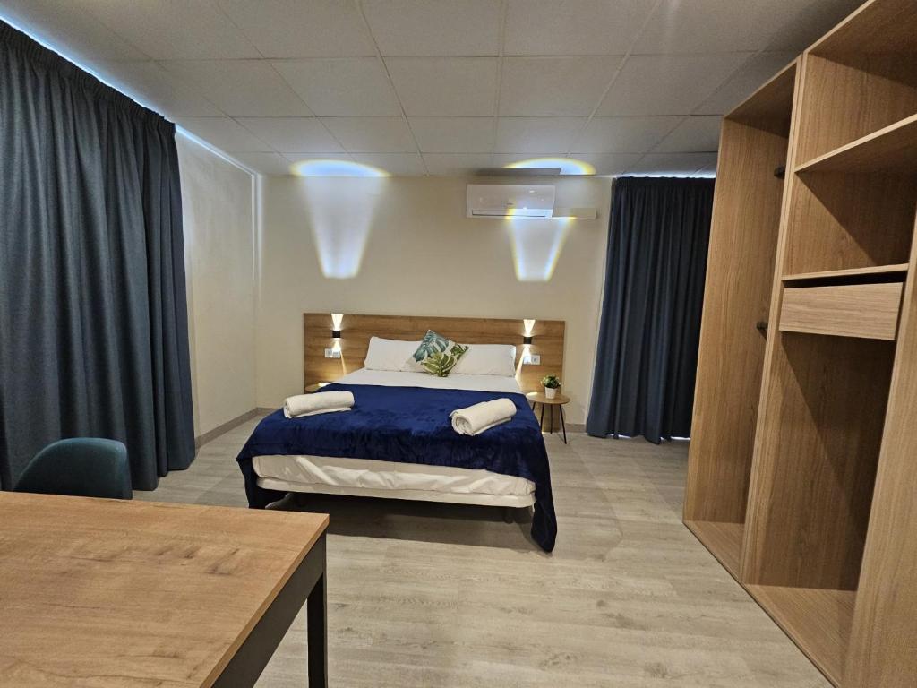 Postel nebo postele na pokoji v ubytování Hotel Mar i Sol