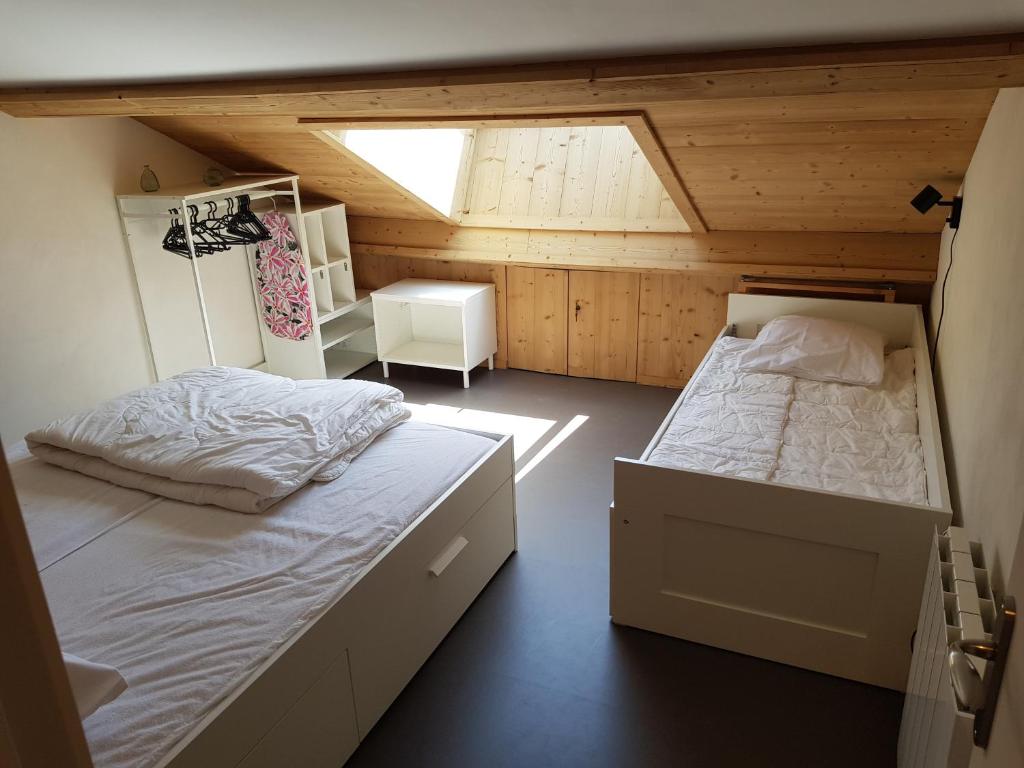 Postel nebo postele na pokoji v ubytování Les biches du Soula 5 couchages proche piste ski