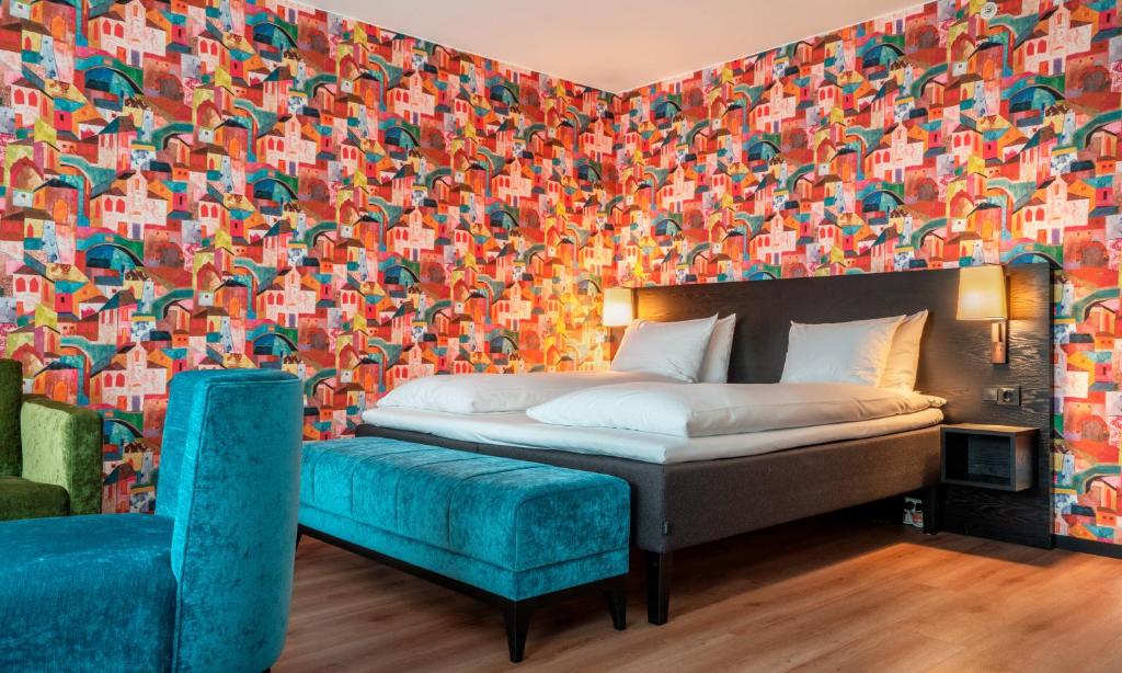 Postel nebo postele na pokoji v ubytování Thon Hotel Hammerfest