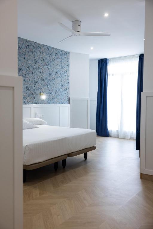 Postel nebo postele na pokoji v ubytování Venecia Plaza Centro