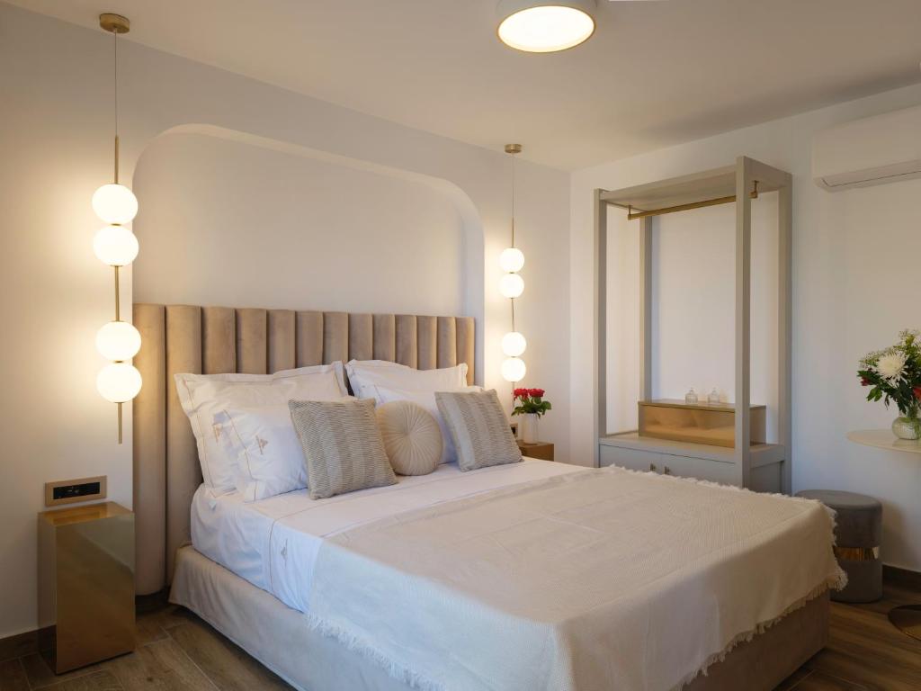 Кровать или кровати в номере Golden Luxury Suites