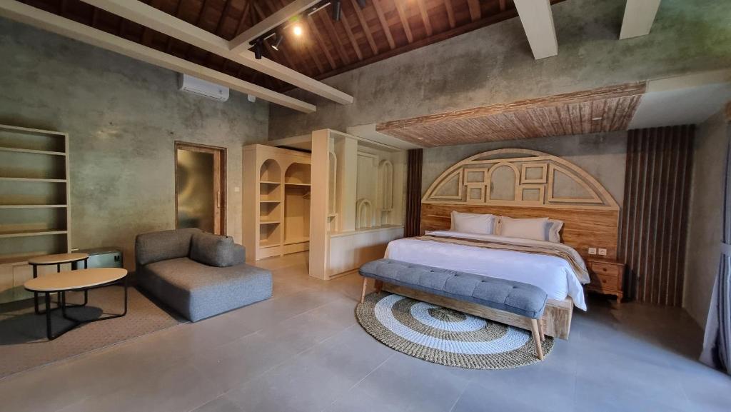 Postel nebo postele na pokoji v ubytování Gandatera Ubud