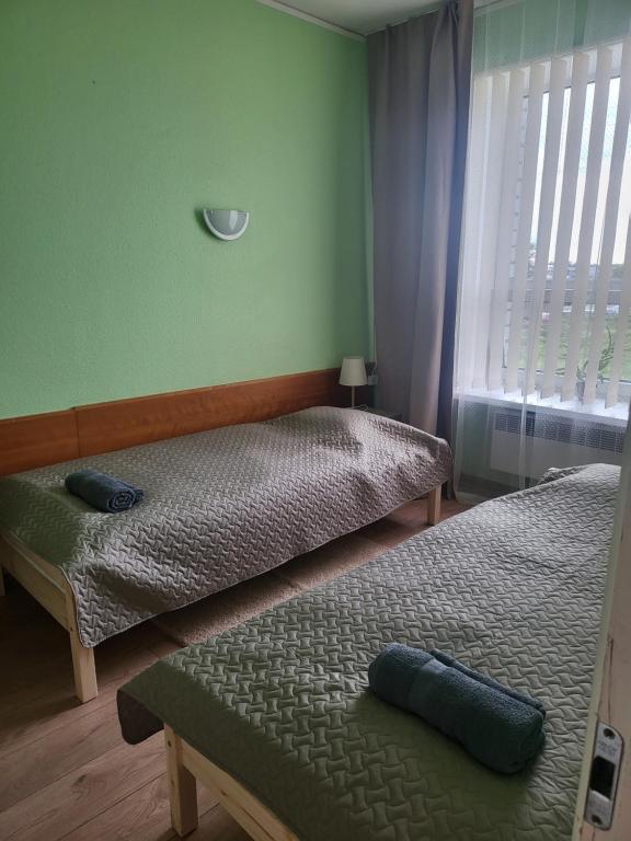 Postel nebo postele na pokoji v ubytování Transhostel FAMILY