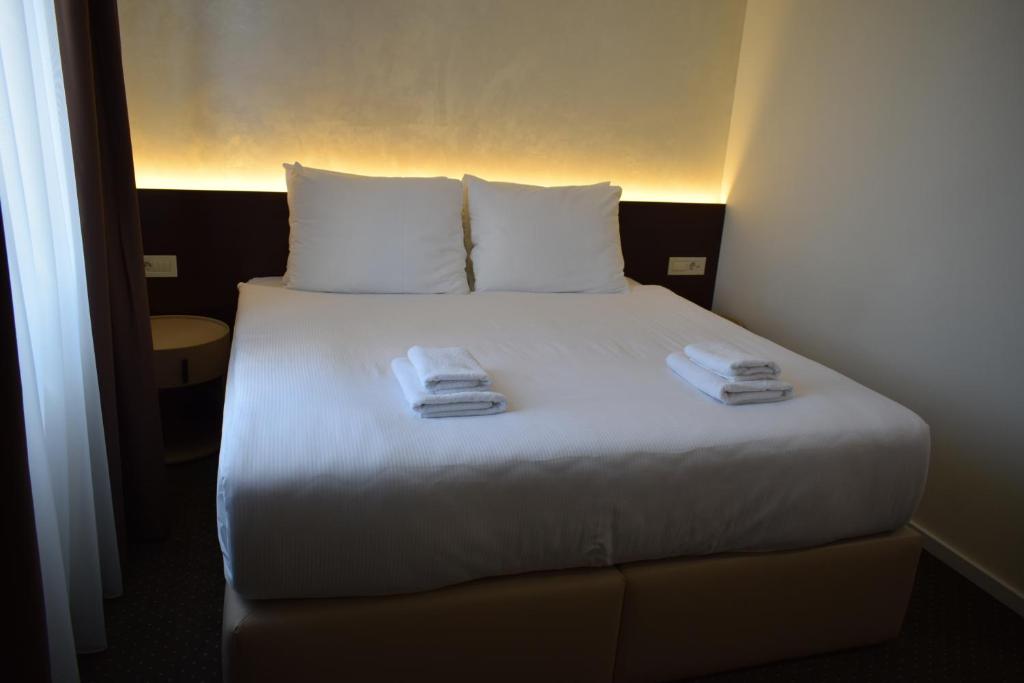 Krevet ili kreveti u jedinici u okviru objekta Nobel West Hotel