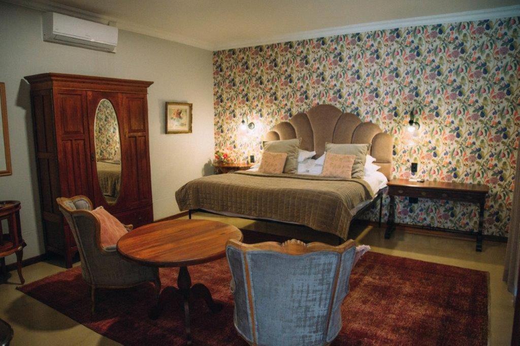 Postel nebo postele na pokoji v ubytování The Bohemian Guesthouse