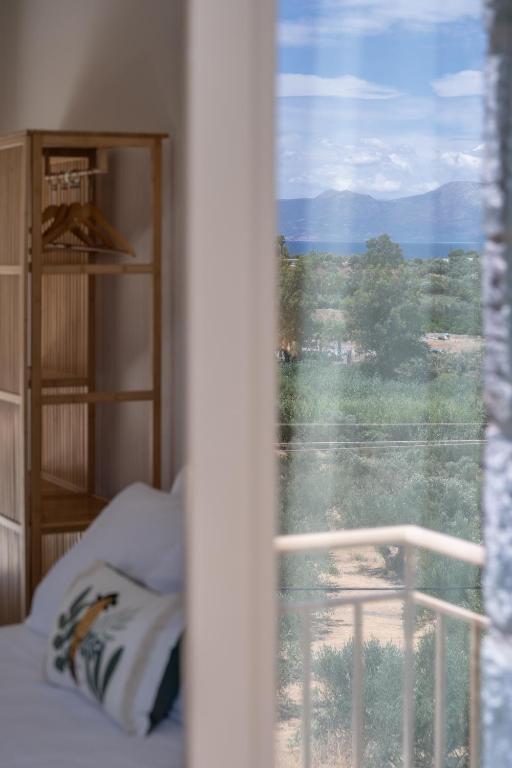 Postel nebo postele na pokoji v ubytování Istorima Guesthouse