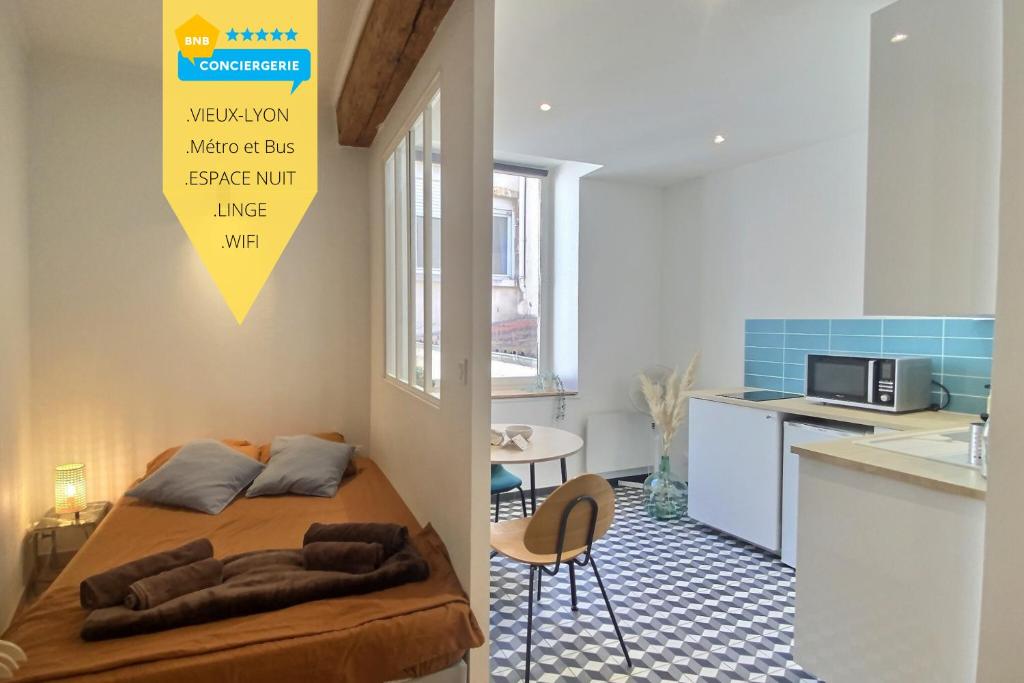 Kuchyň nebo kuchyňský kout v ubytování Le Saint-Georges, BNBConciergerie