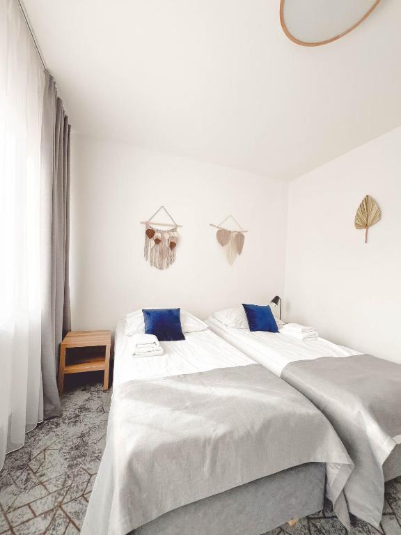 Postel nebo postele na pokoji v ubytování Hotel Beskidian