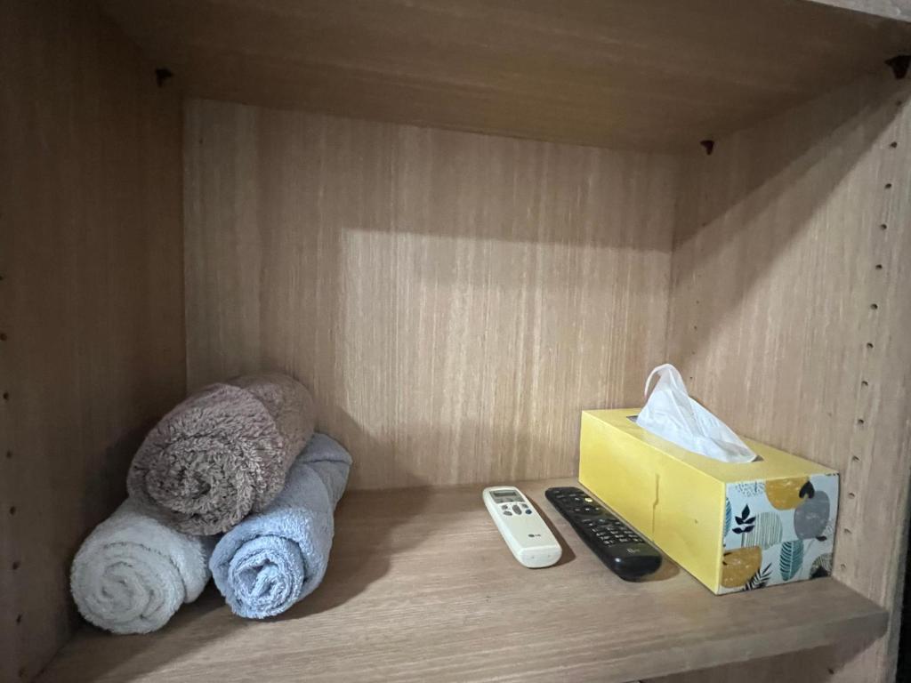 Postel nebo postele na pokoji v ubytování Sangmin suite