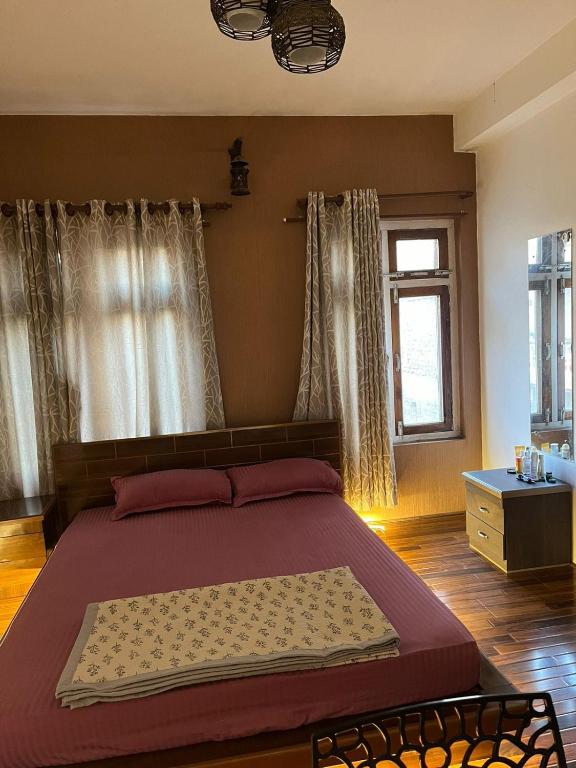 Postel nebo postele na pokoji v ubytování Peakman Residence