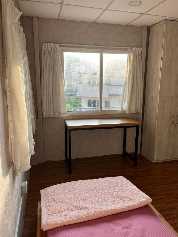 Postel nebo postele na pokoji v ubytování Peakman Residence