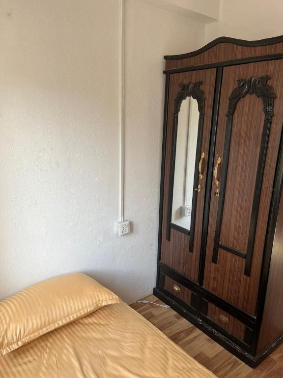 Postel nebo postele na pokoji v ubytování Peakman Residence