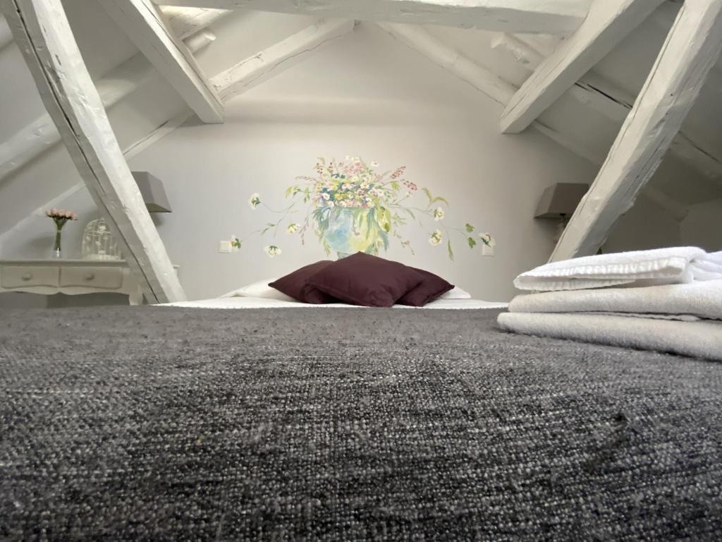 Postel nebo postele na pokoji v ubytování Apartamentos "Casa Abuelo Juan"