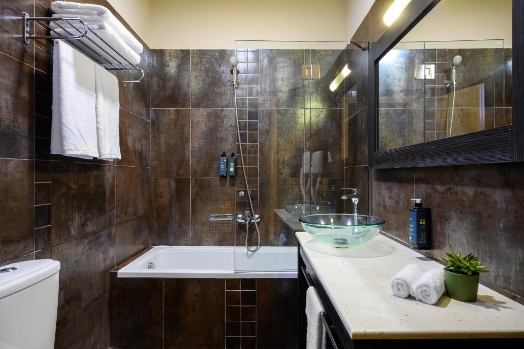 Koupelna v ubytování Elisso Hotel