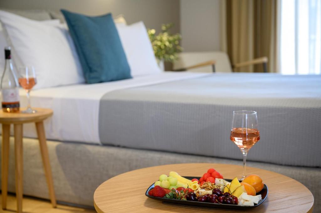 Postel nebo postele na pokoji v ubytování Elisso Hotel