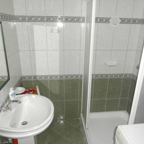 Kúpeľňa v ubytovaní Apartman Ráchegy