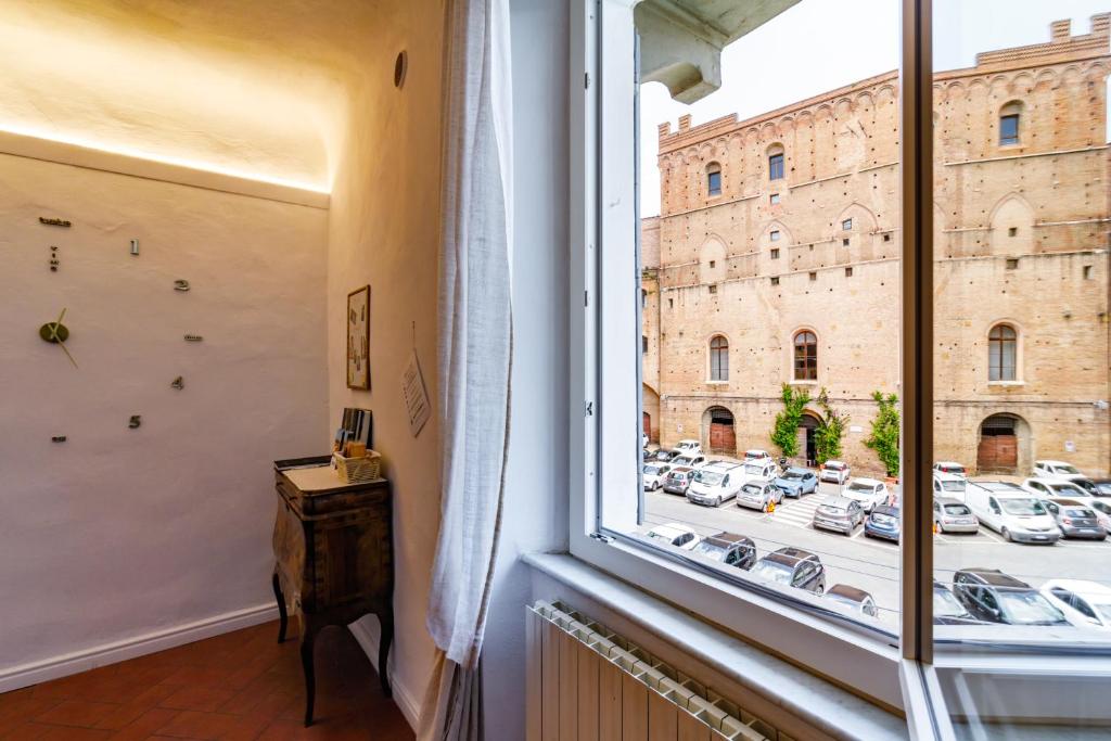 Zdjęcie z galerii obiektu Charme Centro Storico w Sienie