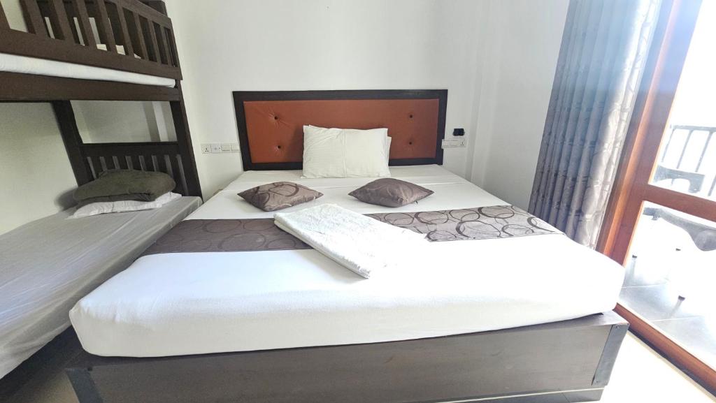Postel nebo postele na pokoji v ubytování Amelia Resort