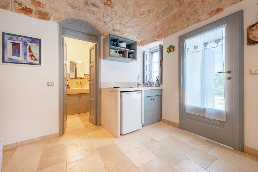 Kuchyň nebo kuchyňský kout v ubytování Relais I Secolari
