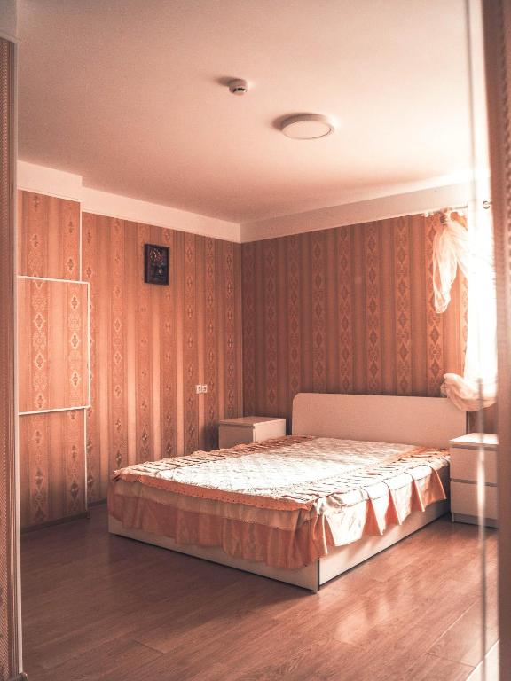 Postel nebo postele na pokoji v ubytování Tatjanos Dvaras
