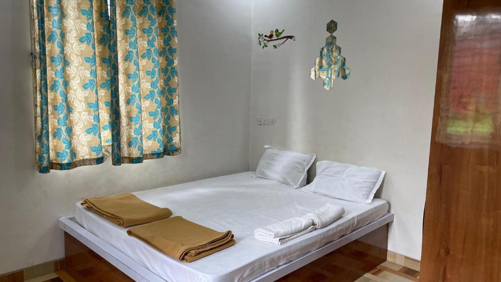 Postel nebo postele na pokoji v ubytování Avni Greens