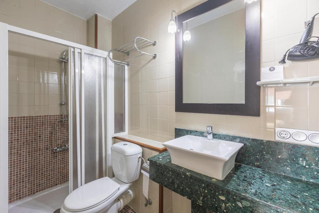 Un baño de Itaca Colón by Soho Boutique