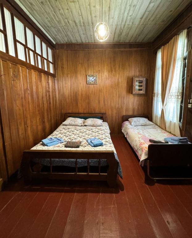 Postel nebo postele na pokoji v ubytování Martvili Guest House OASIS
