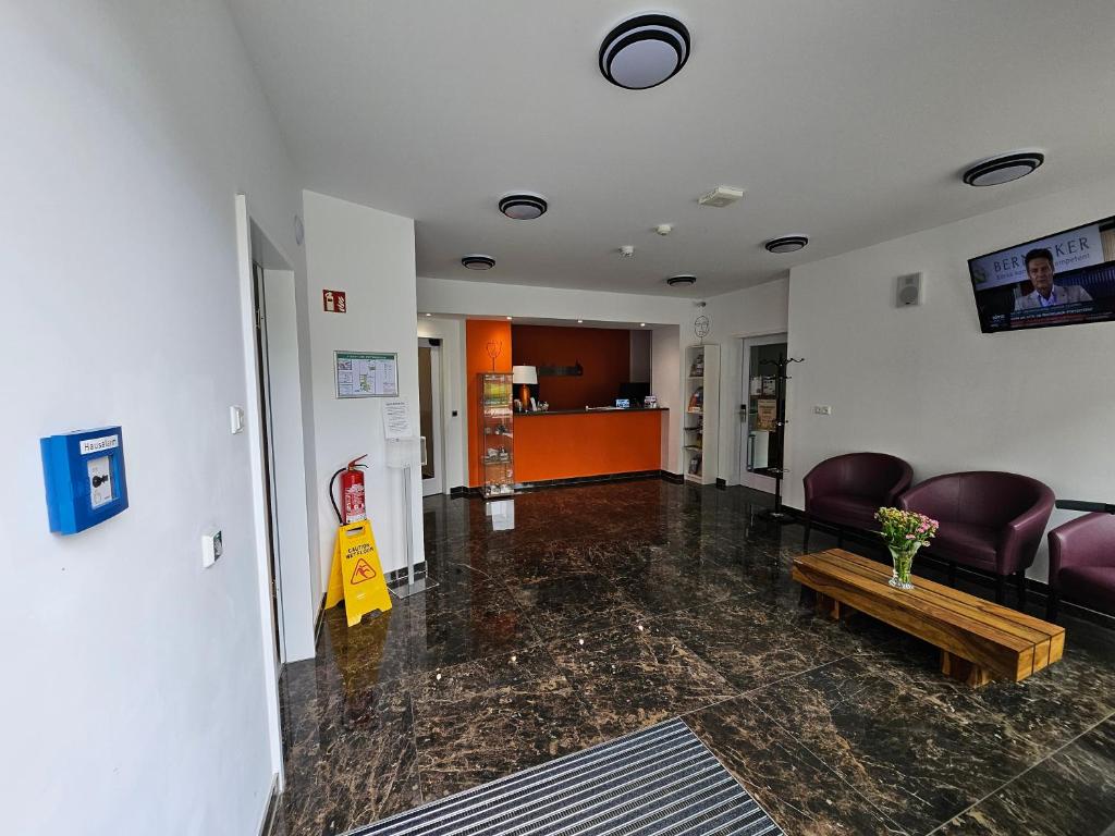 TV a/nebo společenská místnost v ubytování Hotel Amber Altstadt
