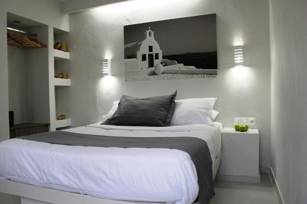 Letto o letti in una camera di Perissa BeachFront Rooms