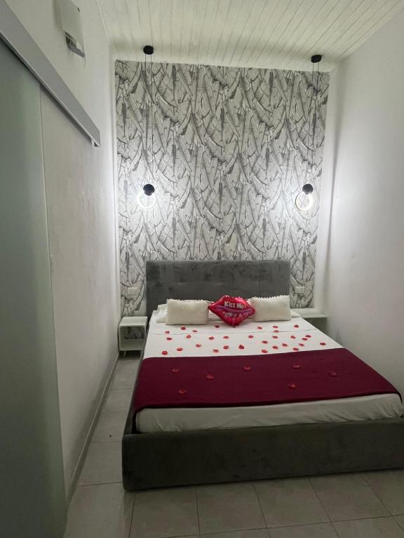 Łóżko lub łóżka w pokoju w obiekcie B&B Regina Rooms