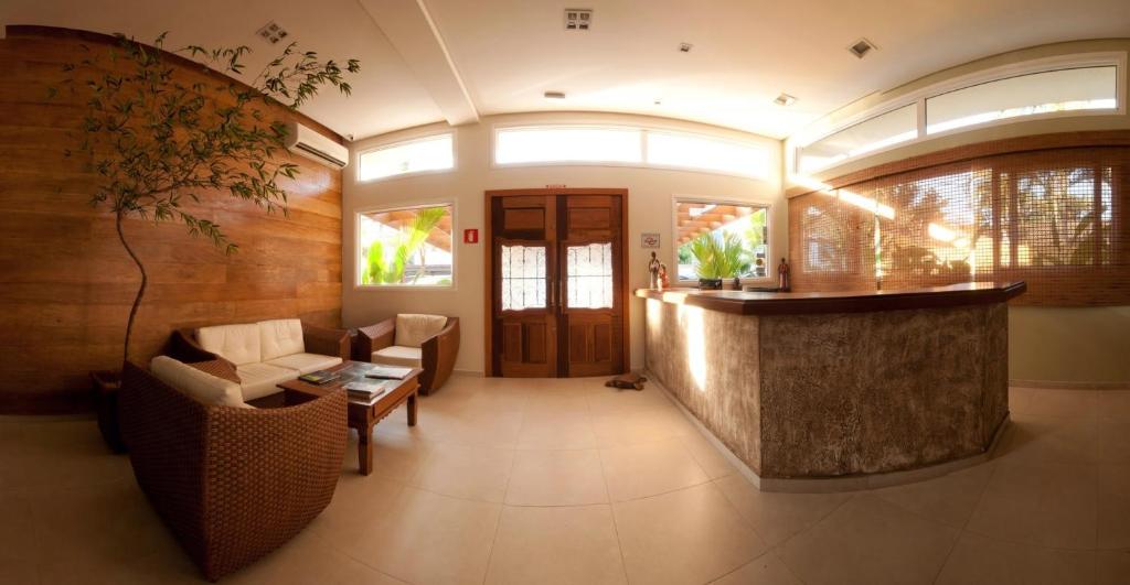 Uma área de estar em Juquehy La Plage Hotel