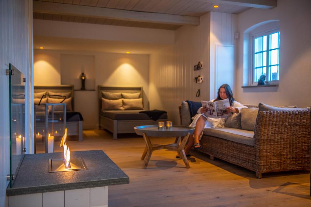 Posezení v ubytování Hotel Rusthållargården