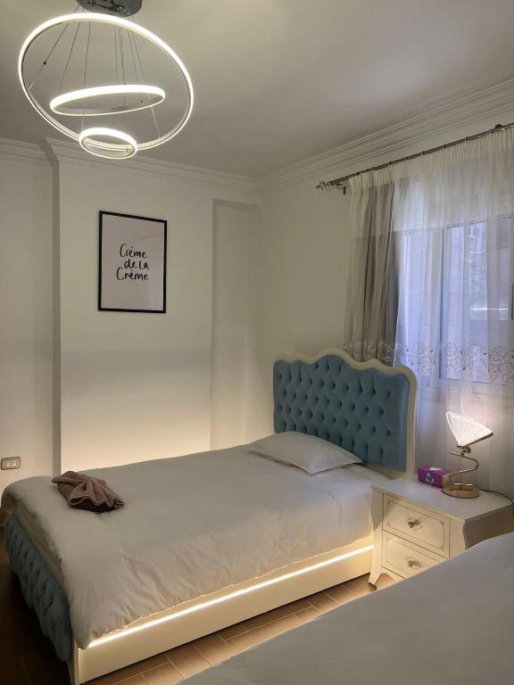 Postel nebo postele na pokoji v ubytování oasis guest house
